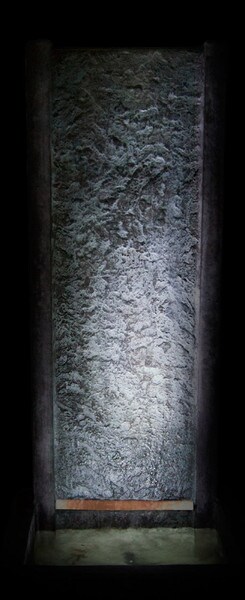 Nighttime View of Slate Fountain Rugged Water Cascading down front